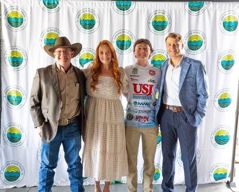 James Walker standing with the other winners of The Singing River Trail Launch Tank