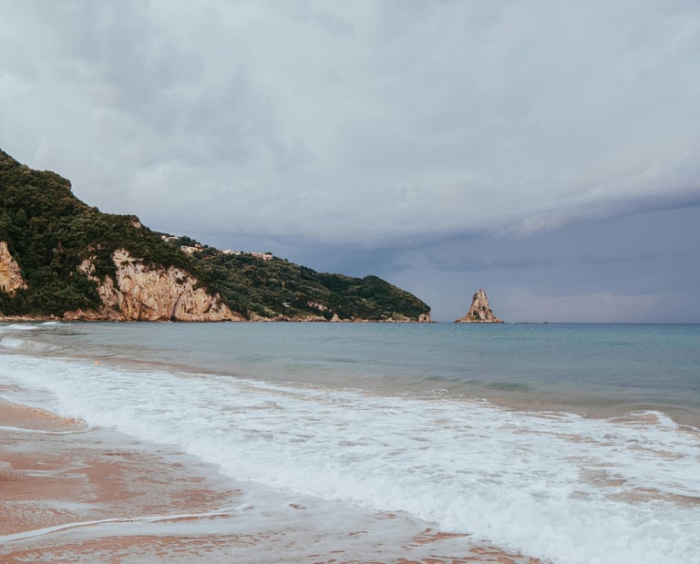 a beach with a boat in the water