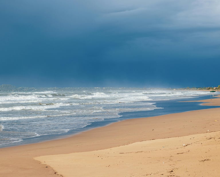 a beach with a boat in the water