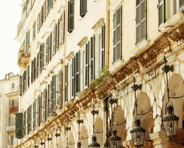 a group of people in uniform marching through a city