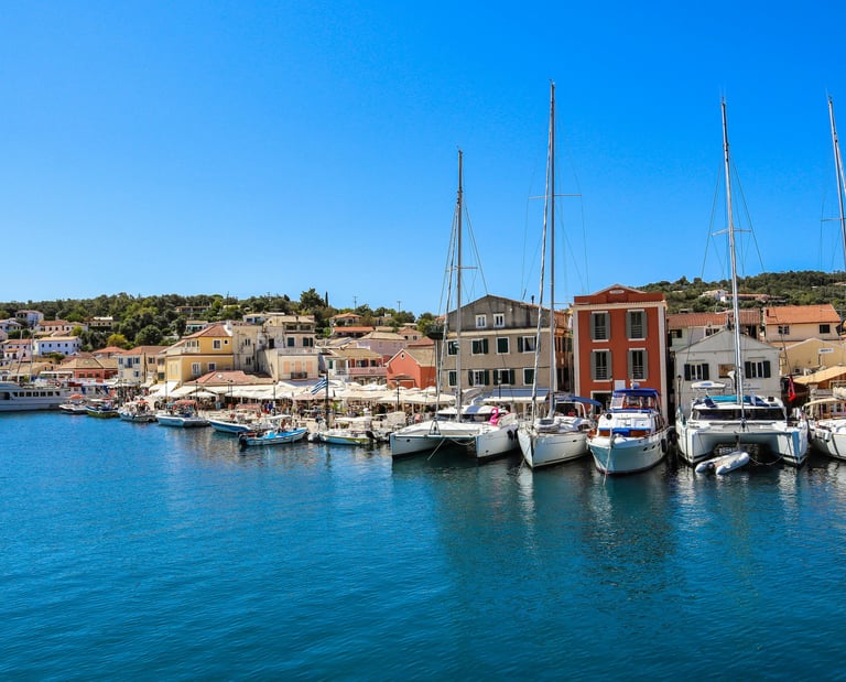 a harbor with boats and buildings in the background
