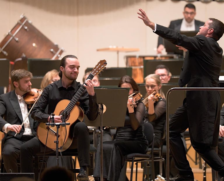 Classical guitarist Filip Babic playing with an orchestra