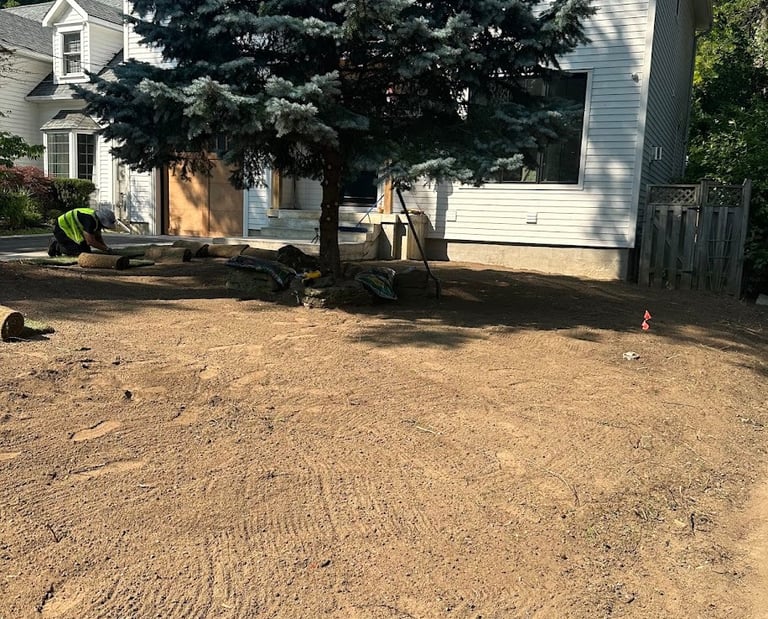 Residential lawn being graded before sod installation