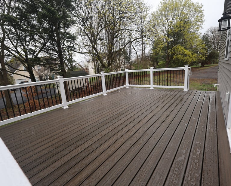Trex composite decking with vinyl railings and aluminum balusters
