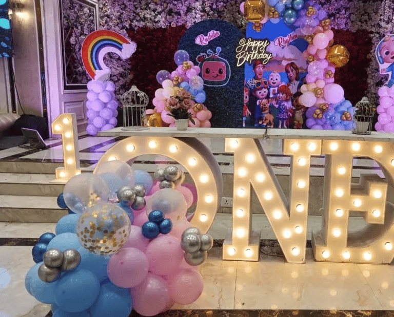 a balloon - shaped sign with balloons and balloons