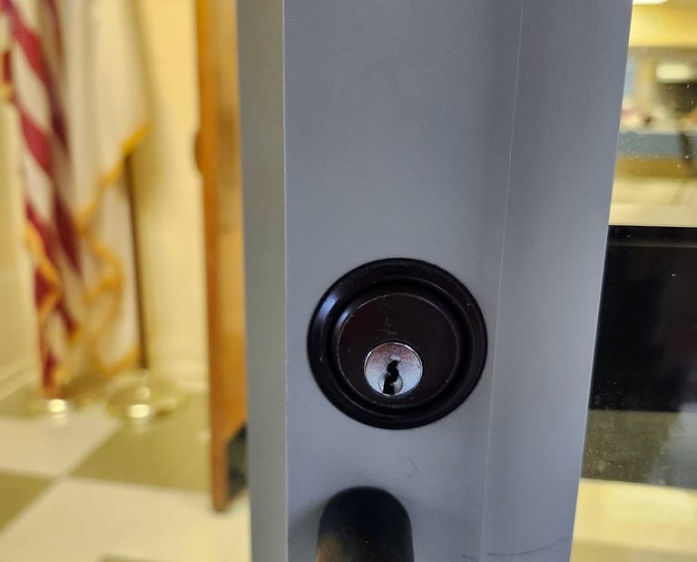 Close up of a commercial door lock and handle on a business entrance