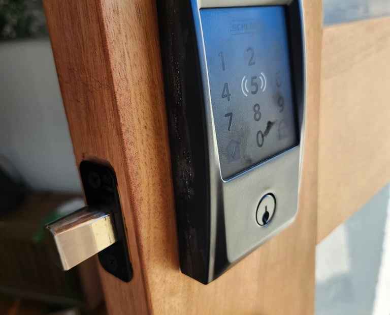 Keypad smart lock installed on a wooden exterior door