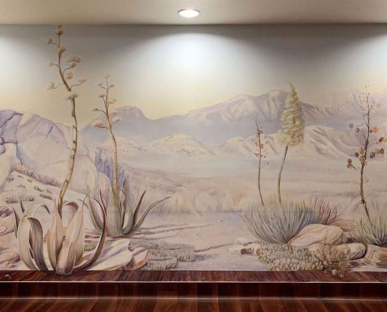 Panoramic desert mural across a private clinic waiting room wall