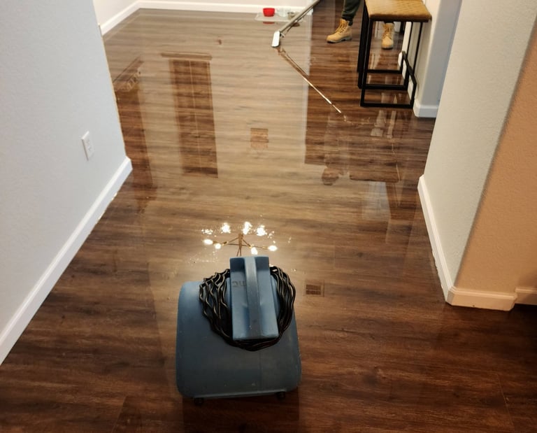 flooded-home-in-cedar-park-sucking-out-water-off-the-floor