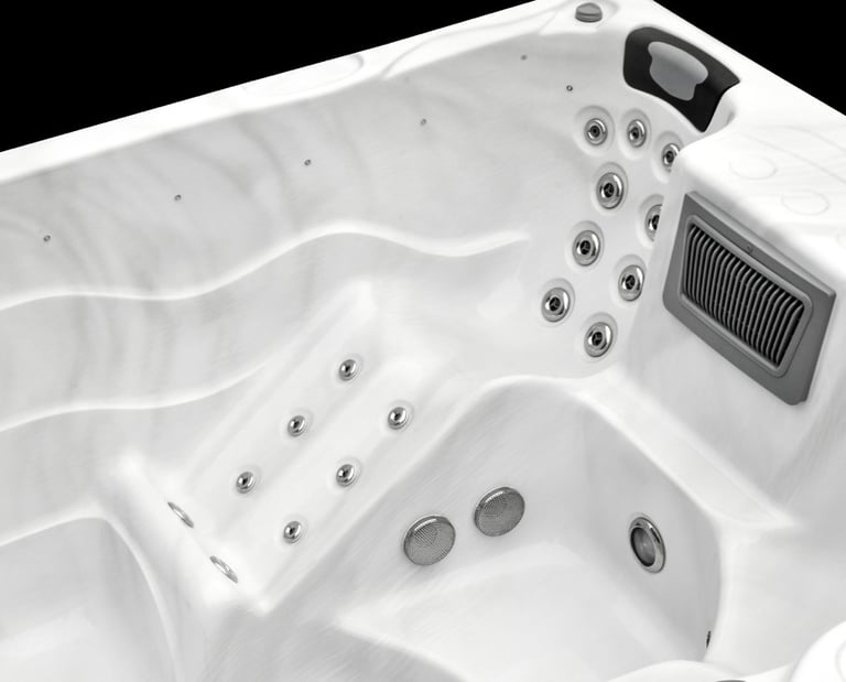 a hot tub with a remote control and a remote control