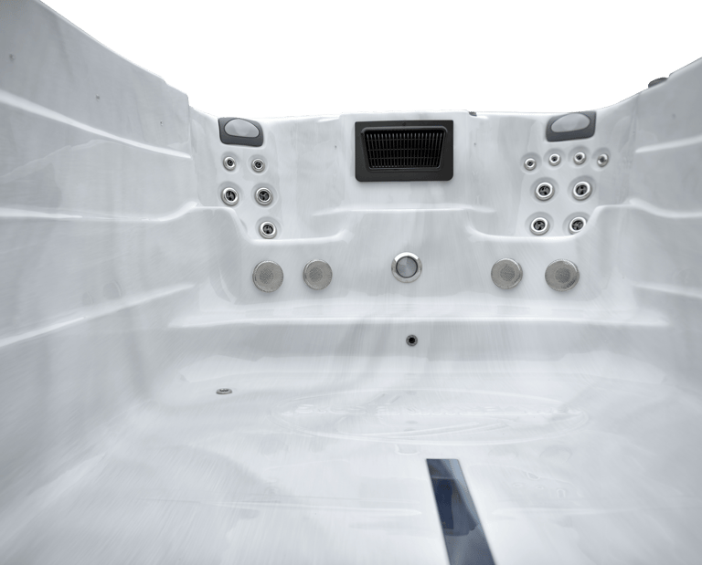 a hot tub with a large white tub and a black and white tub