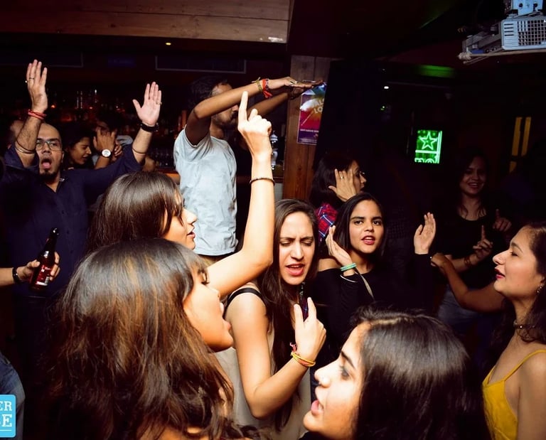 a group of people standing around a party