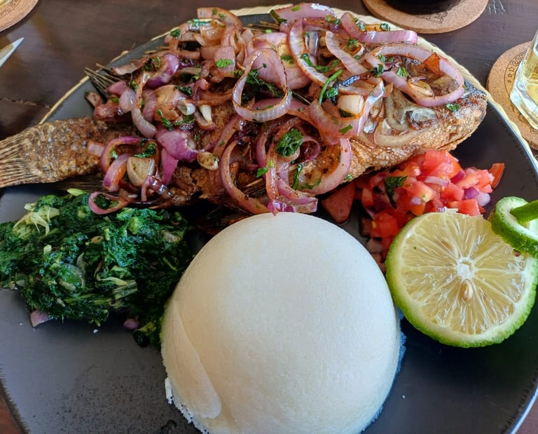 Whole Dry Fry Tilapia with Ugali & Greens