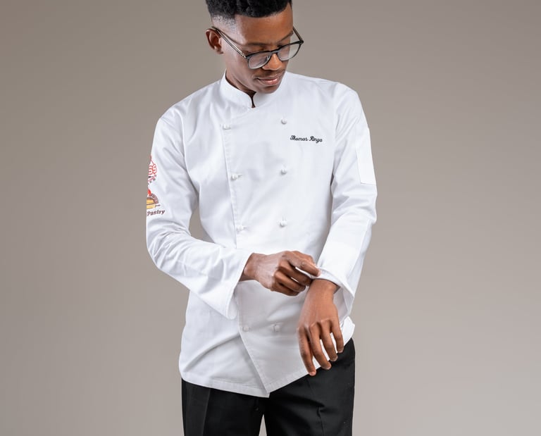 a man in a white shirt and black pants