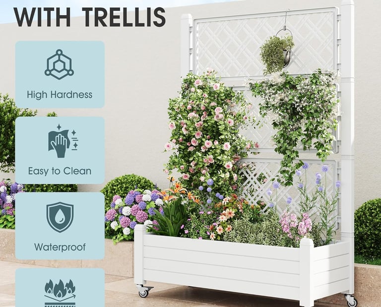 White raised garden bed with trellis on wheels featuring climbing flowers and roses for outdoor decor.