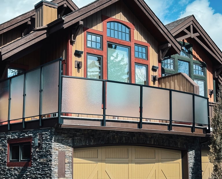 Legacy Decks Ltd. Privacy glass railing. Powder-coated durable aluminium railing systems