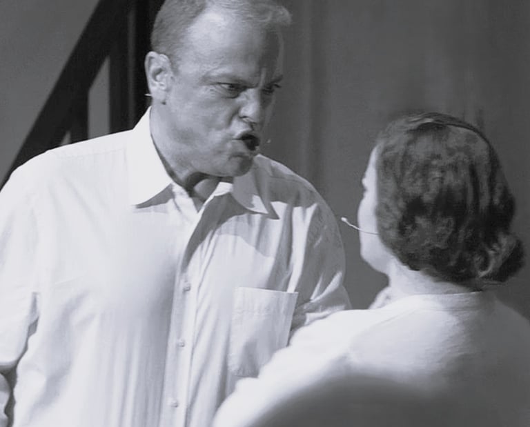 An angry man confronting Young Catherine.