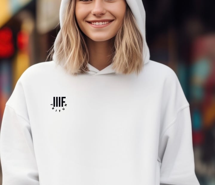 a woman wearing a white hoodie with the word jie on it