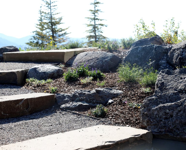 a stone steps leading up to a stone stepstone