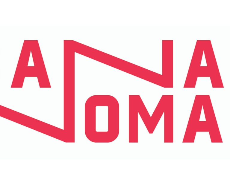 a red and white logo with the words sanatonomad