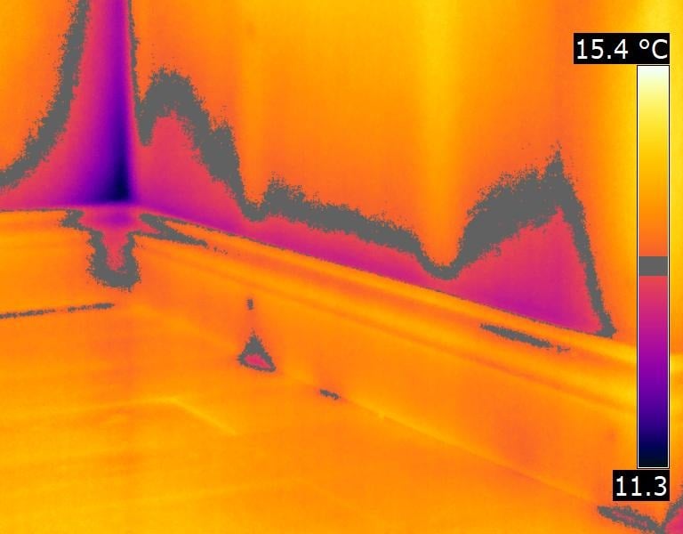 thermal imaging of wall cavity showing moisture