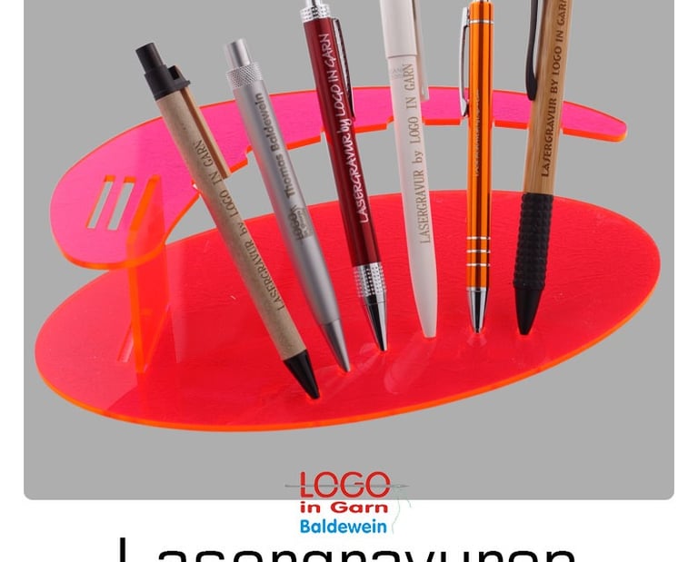 a group of pens and pens sitting on a table