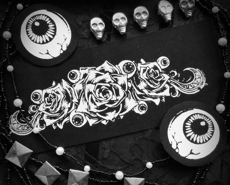 creepy but elegant roses and eyeballs patches