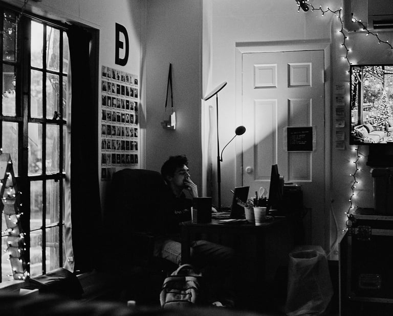 Harrison in office on laptop