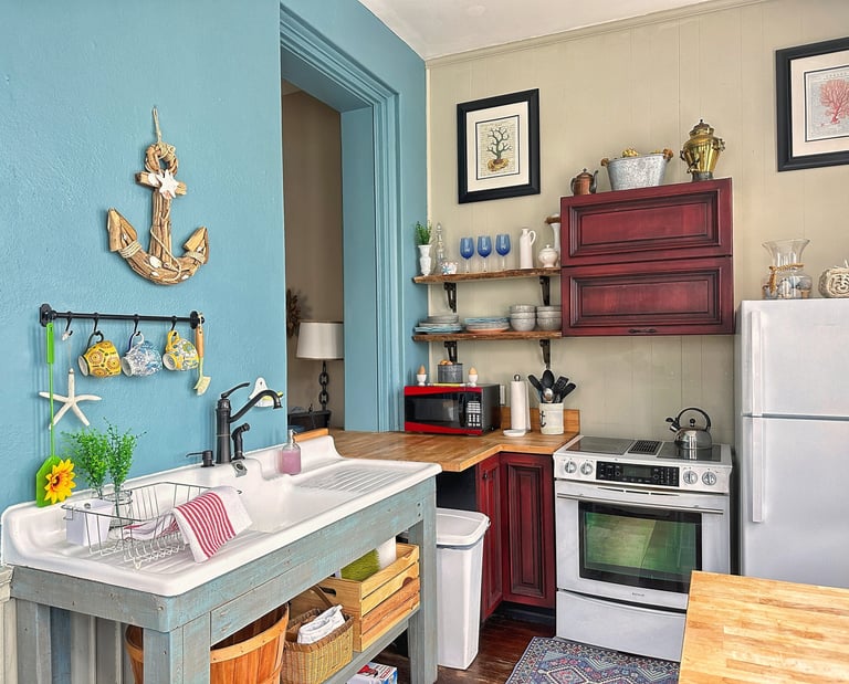 kitchen with farm style sink and white appliances 2123 rivermont apartments