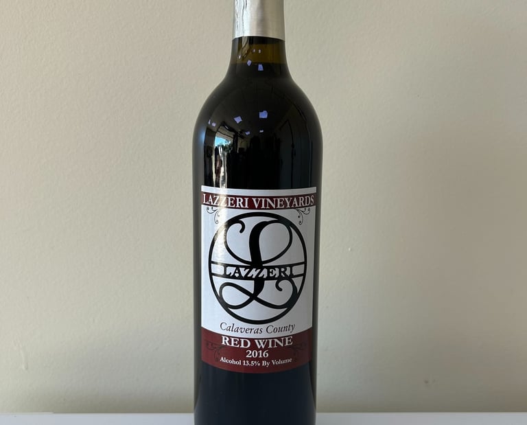 A close up picture of a wine bottle labeled 2016 Red Wine