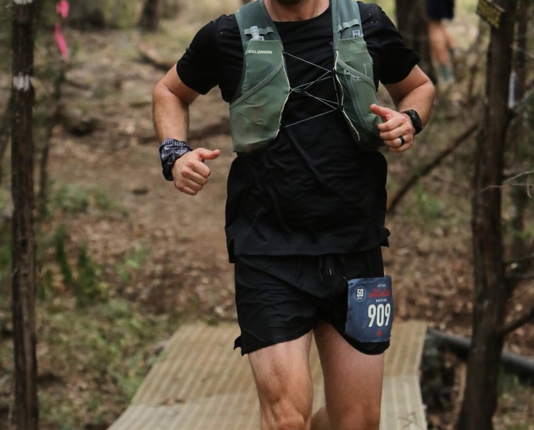 a photo of world class athlete derek pirtle racing the Austin Rattler 50K Ultra Marathon in Texas