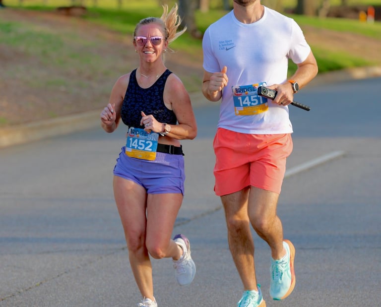 A photo of a beautiful couple running a fun Race Ready Events 5k together