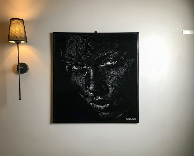 One-of-one broken glass portrait artwork on laminated glass