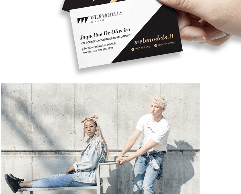 a person holding a business card with a business card