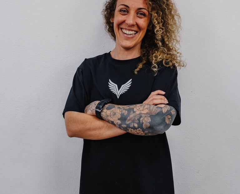 Gérant de Crossfit Valkaia Pau, femme de 40ans souriante