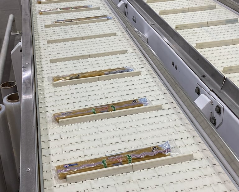 Banda transportadora de pasta empacada