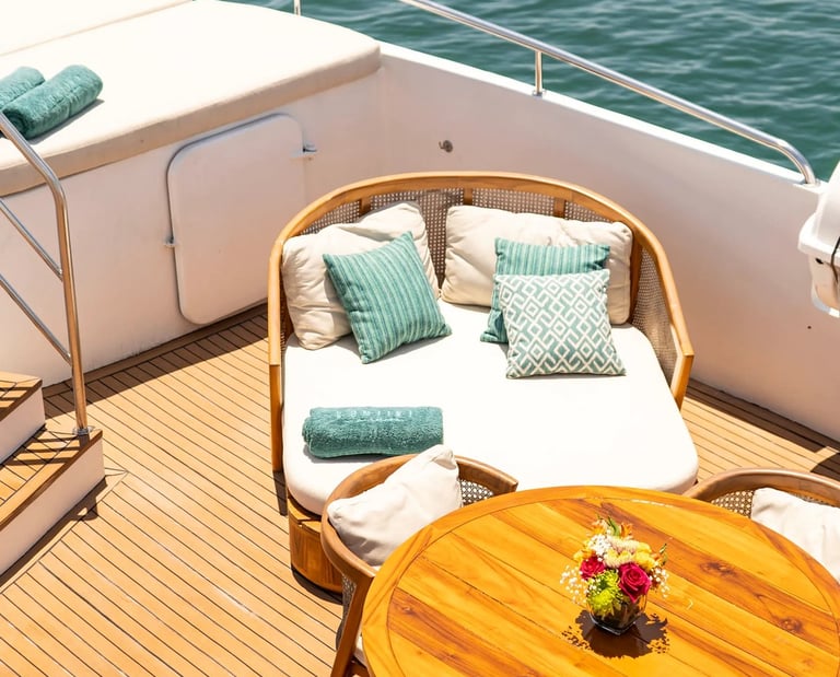 Private yacht outdoor lounge with elegant seating, designed for luxury expedition cruises