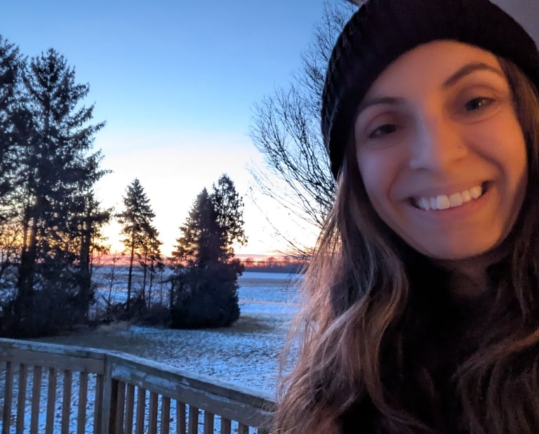 a photo of Danielle during a snowy sunset