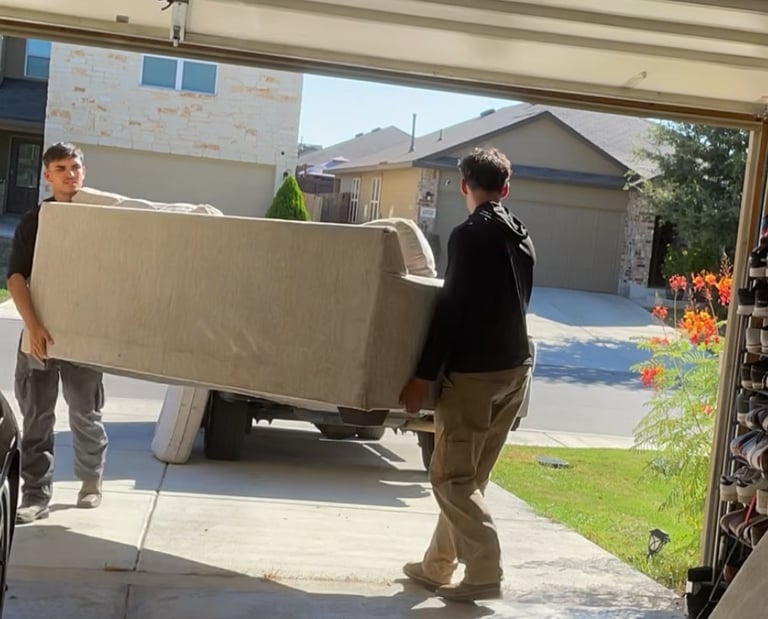 JP and Alexinf Removing a Couch In San Antonio