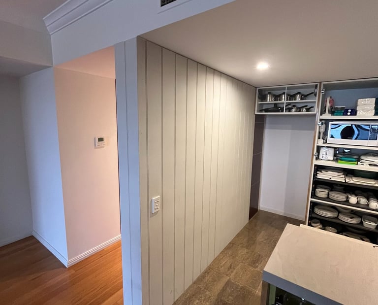 Custom interior wall panelling and carpentry renovation in Sydney home