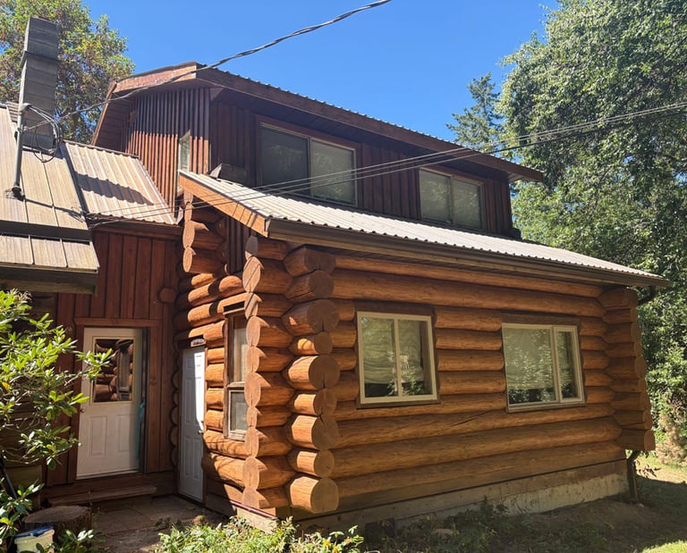 Log home in Courtenay after restoration by Embassy Restorations Vancouver Island