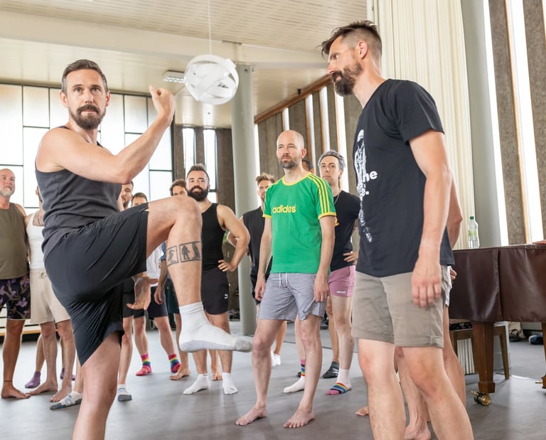 men learning a movement workshop