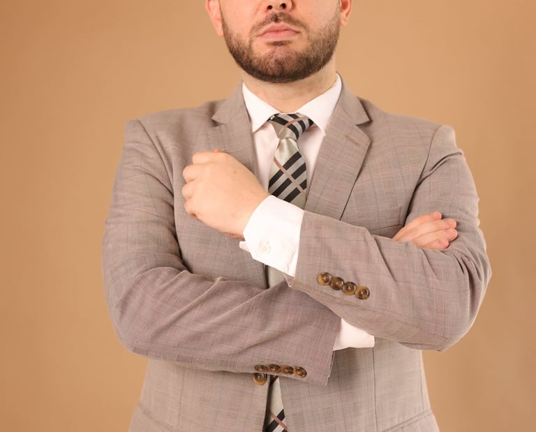 a man in a suit and tie with a tie
