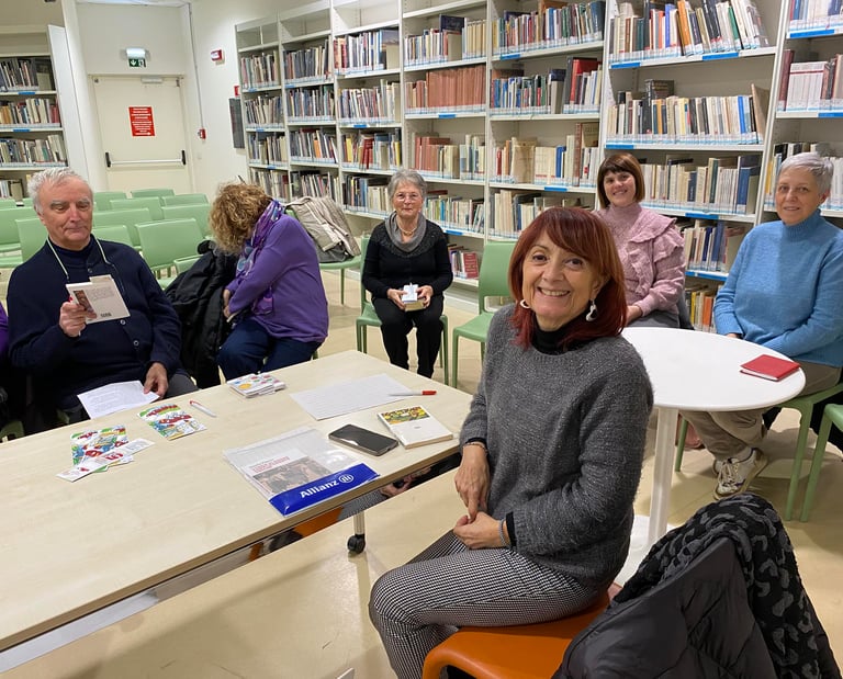 a group of people sitting around a table