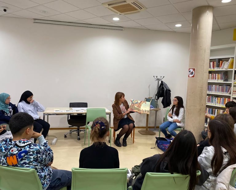 a group of people sitting in chairs in a room
