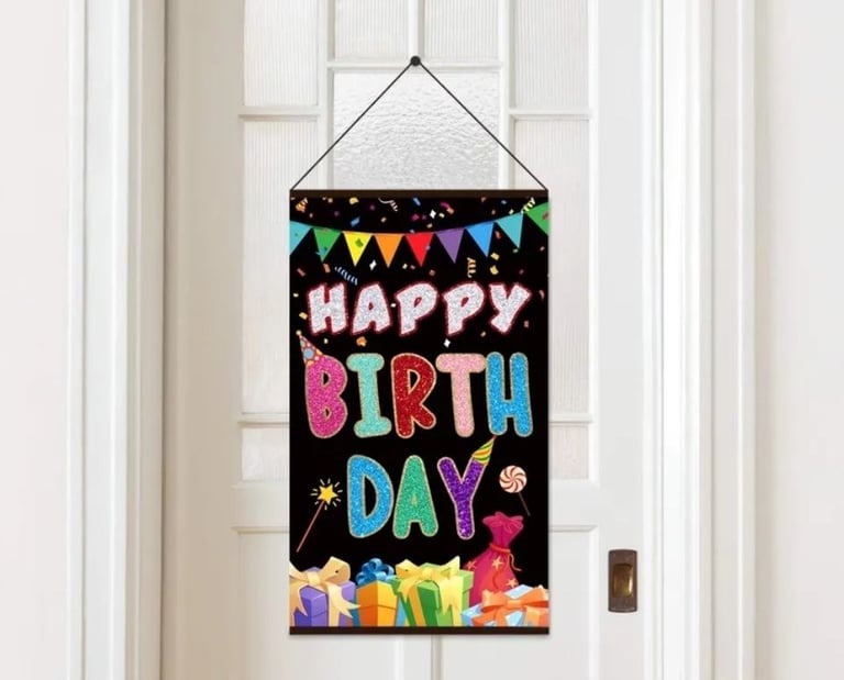 happy birthday sign in a sintra board hanging in door