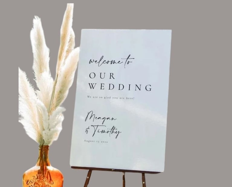 Maegan and timothy. white wedding sign