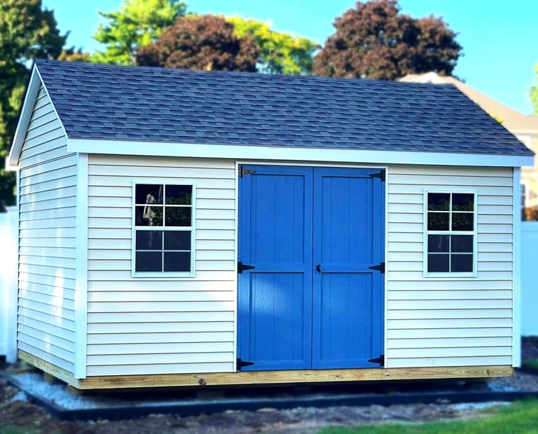 Shed with extended roof overhang built in Massachusetts featuring premium craftsmanship and clean design.