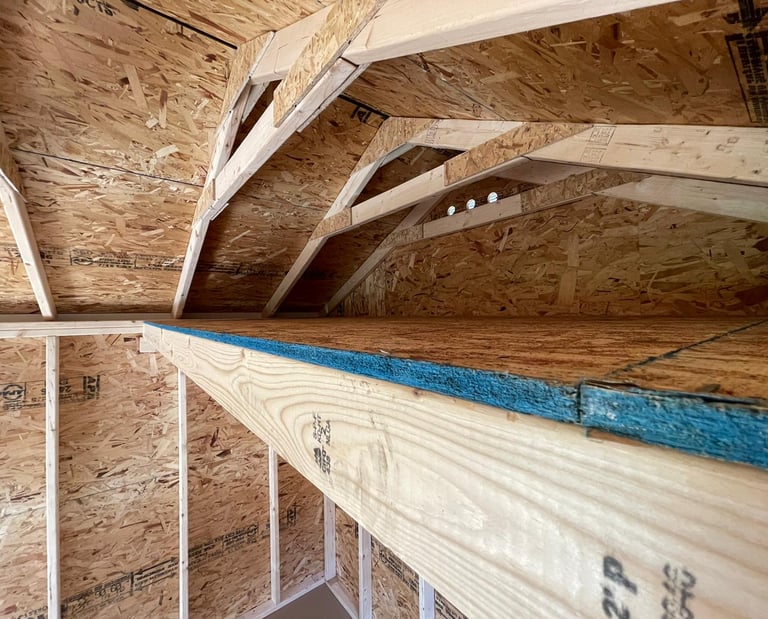 Custom shed with built-in loft for extra storage, handcrafted in Massachusetts and Rhode Island.