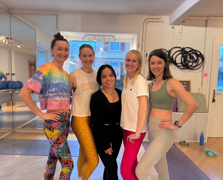 Barre teachers leading low-impact workouts at Joy Movement Studio in Meilen